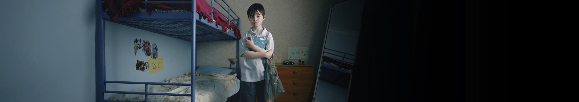 Billy looking sad in his bedroom