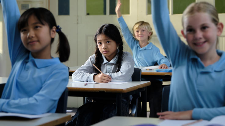 Girl sitting in classroom
