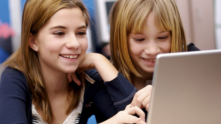 Two girls with a laptop