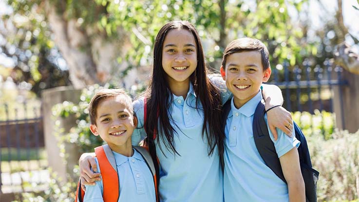 three children smiling