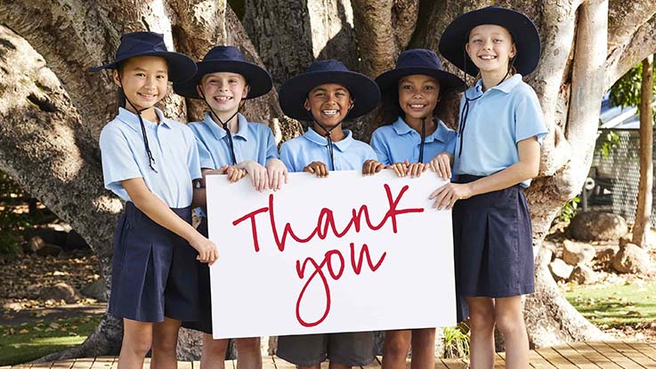 children with thank you sign