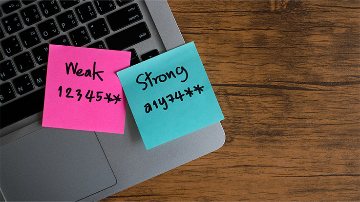 two post it notes on a laptop keyword. one post it says weak and the other says strong
