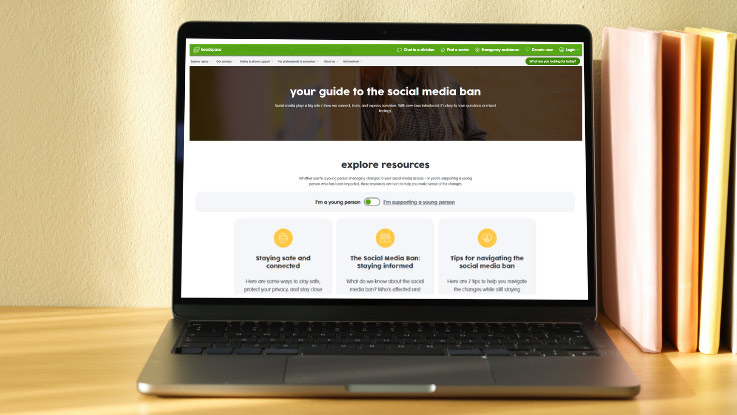 a laptop open with the headspace website page open