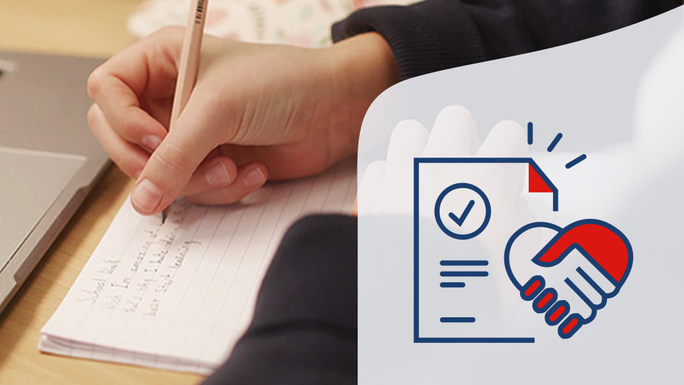 person writing with a pencil on a notebook with a pictogram next to it of a paper with a tick sign and 2 hands shaking