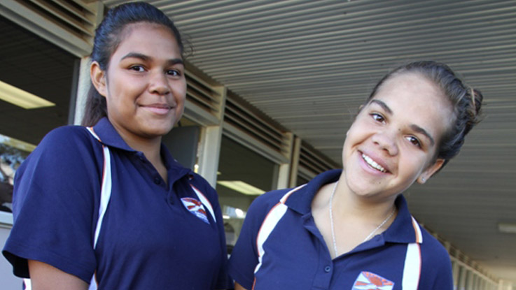 Two girls smiling