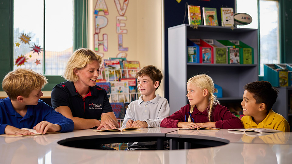 children in a classroom together with a smith family learning for life coordinator