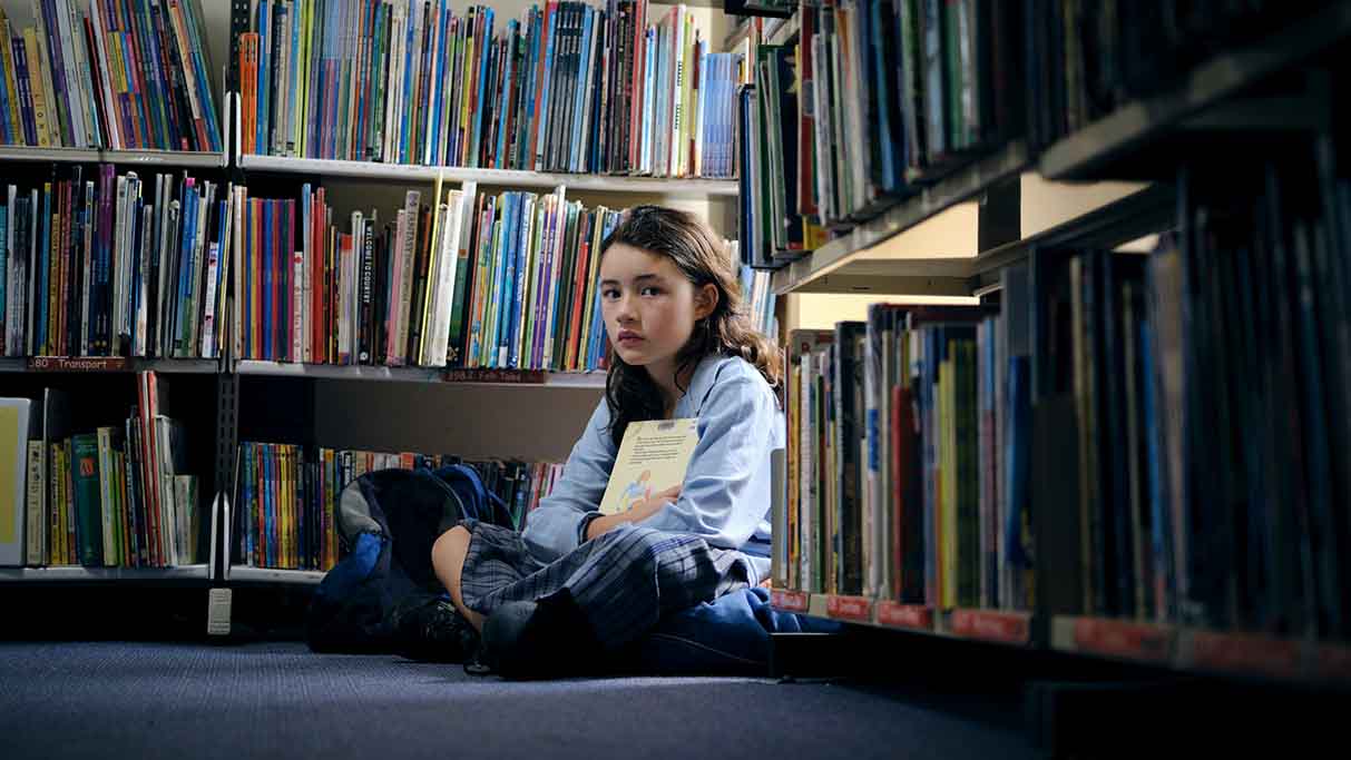catch-up-learning-girl-hiding-in-library