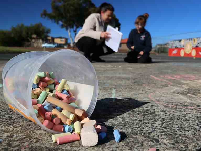 Spilt coloured chalk on ground