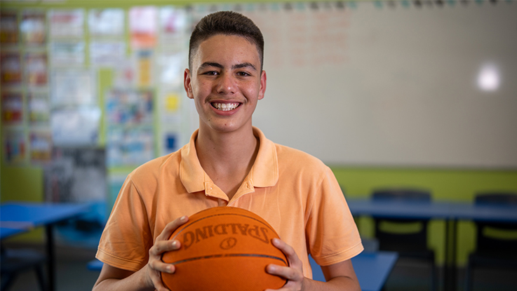 Boy holding a basketball