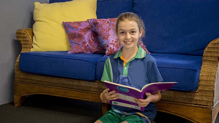 emerald-on-floor-with-book