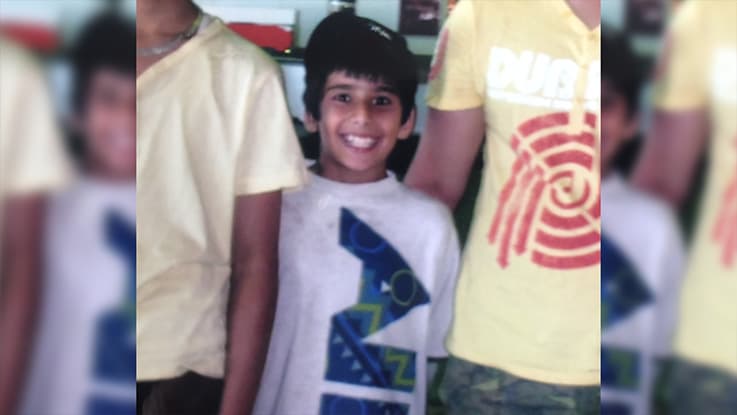 Fahad as a child smiling