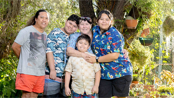 parents smiling with their children together